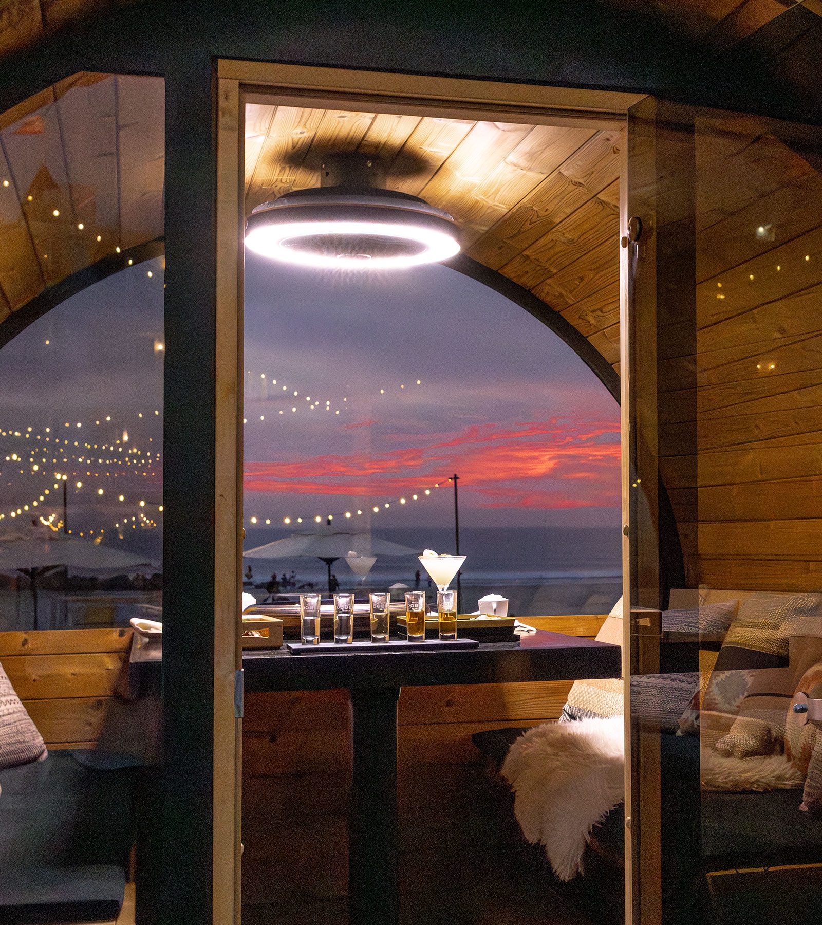 Barrel dining experience at sunset