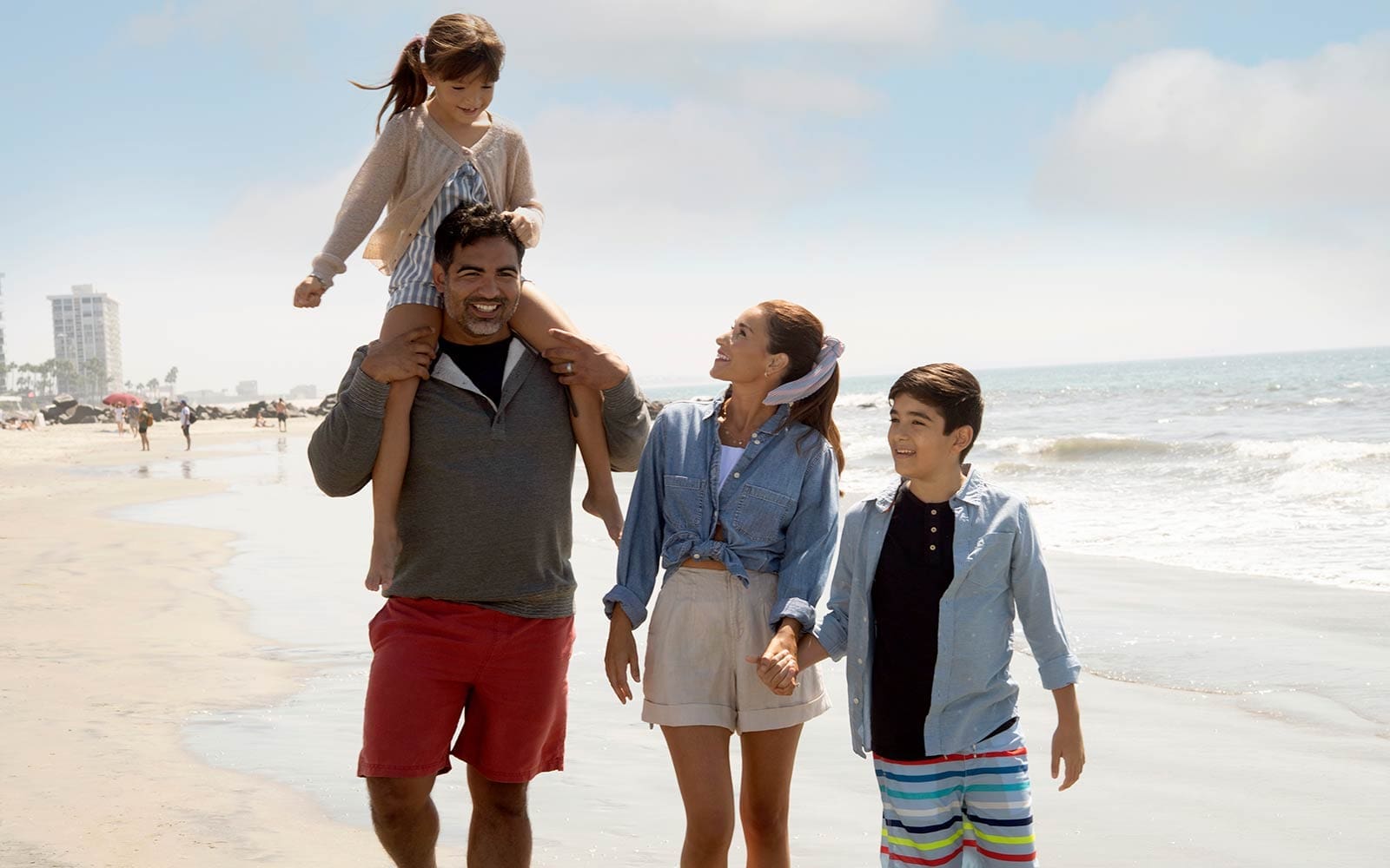 Family walking on the beach