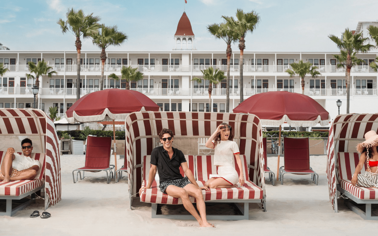 couple on beach daybed