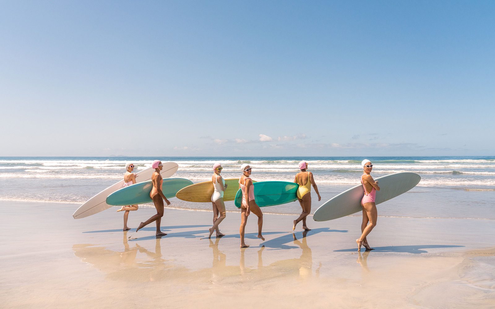 Ladies with surfboards, photo by Gray Malin