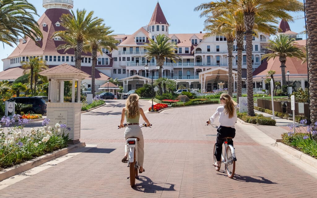 Women riding bikes at The Del
