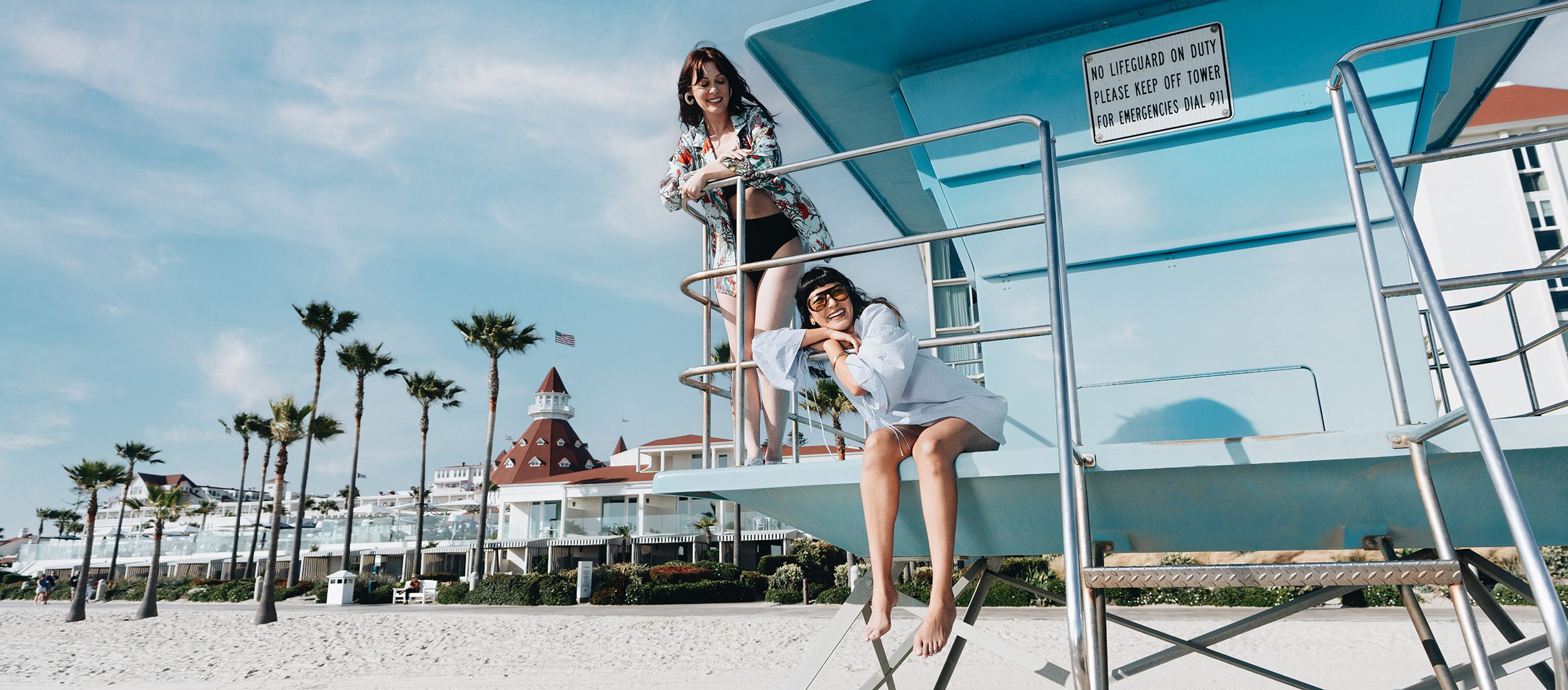Ladies on a beach lifeguard tower