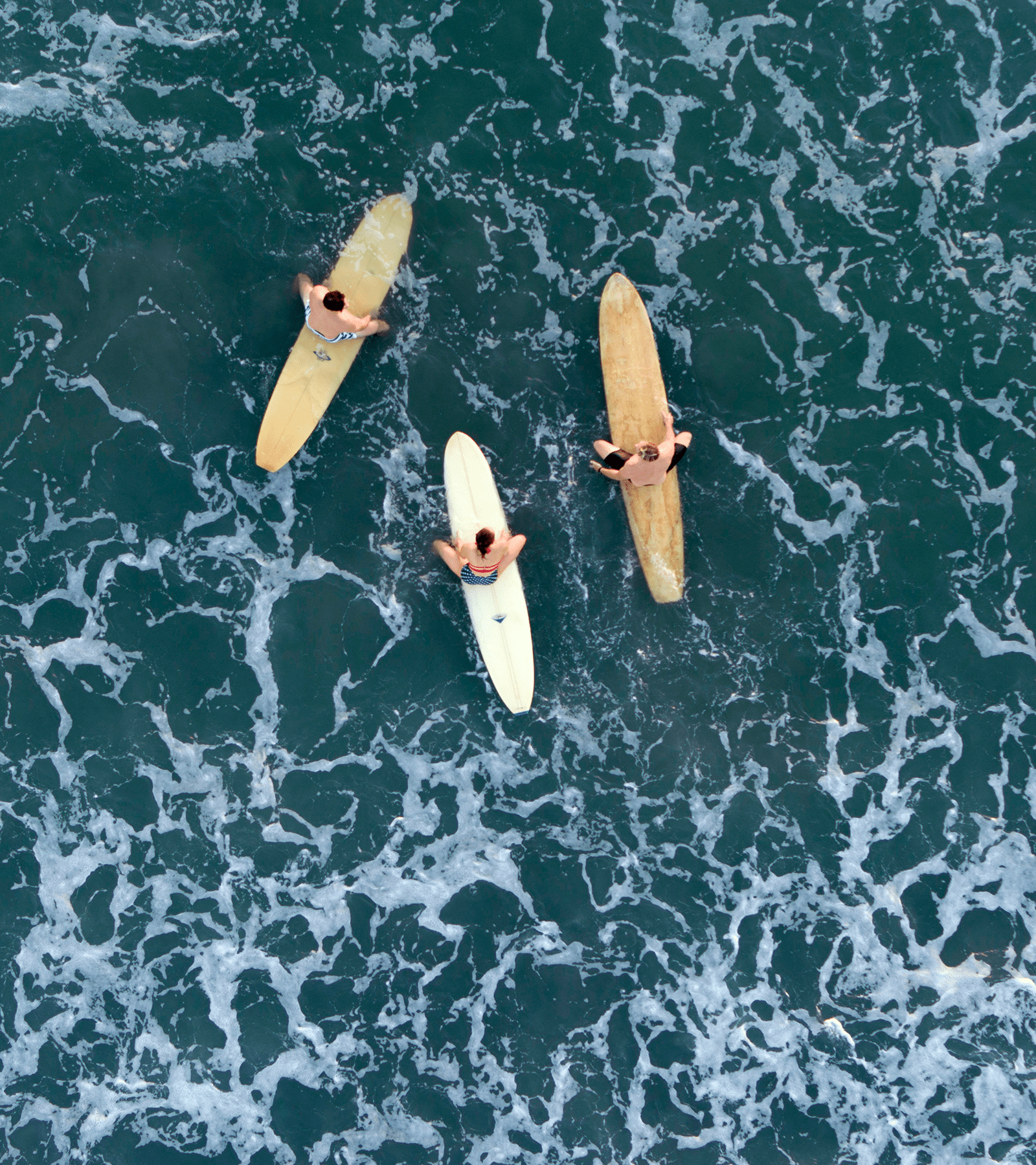 Aerial view of surfers