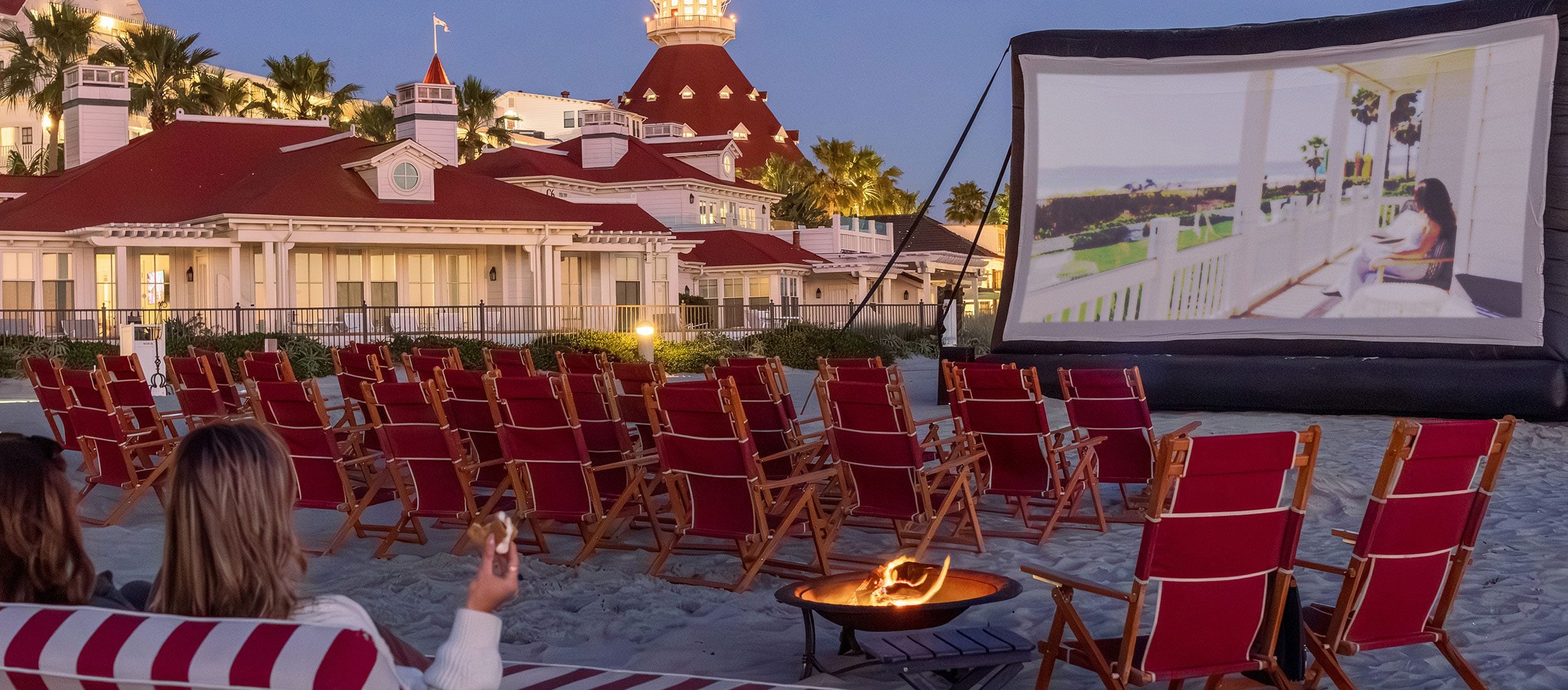 Movie on the beach with fire pit
