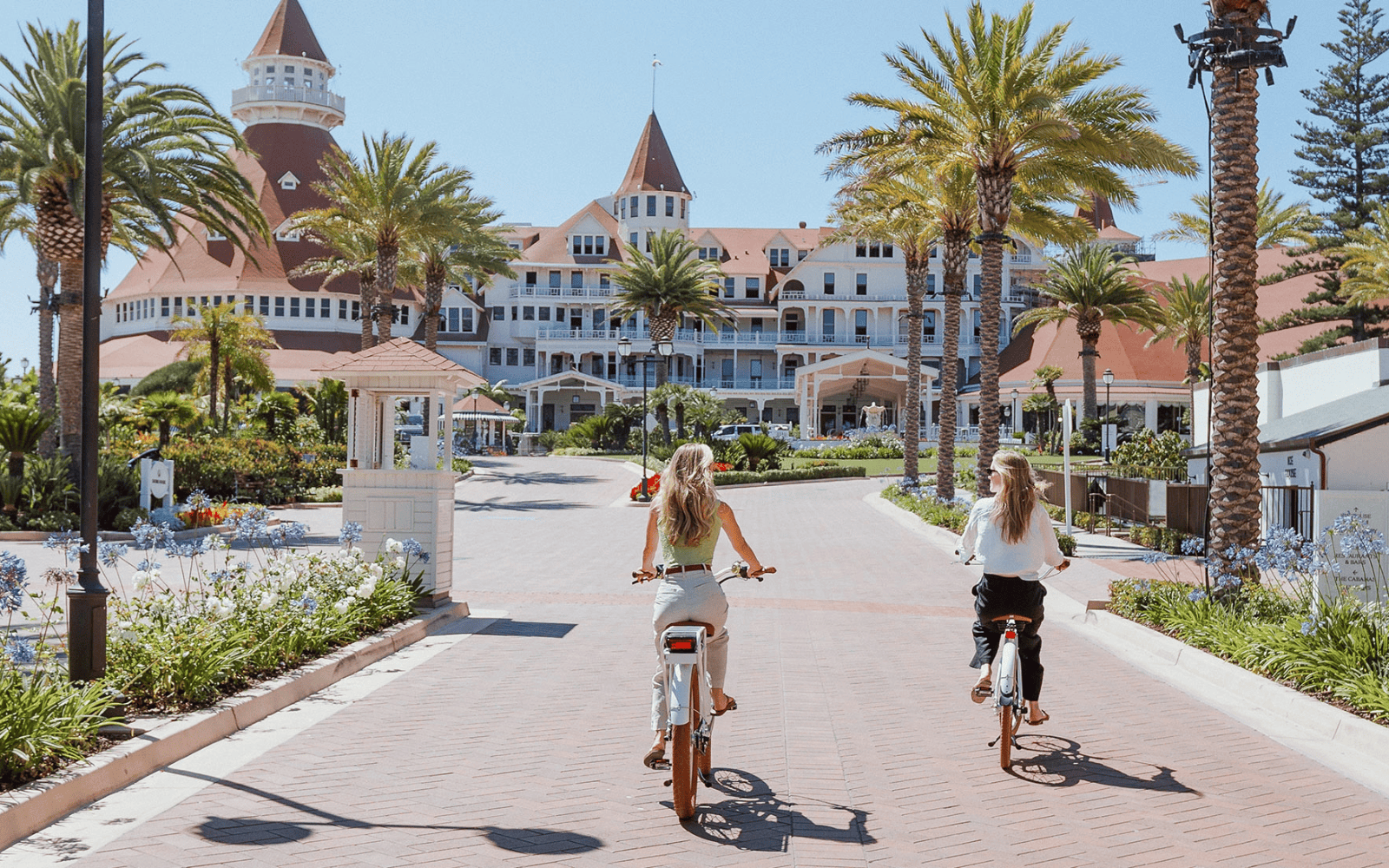 Women on bikes at The Del
