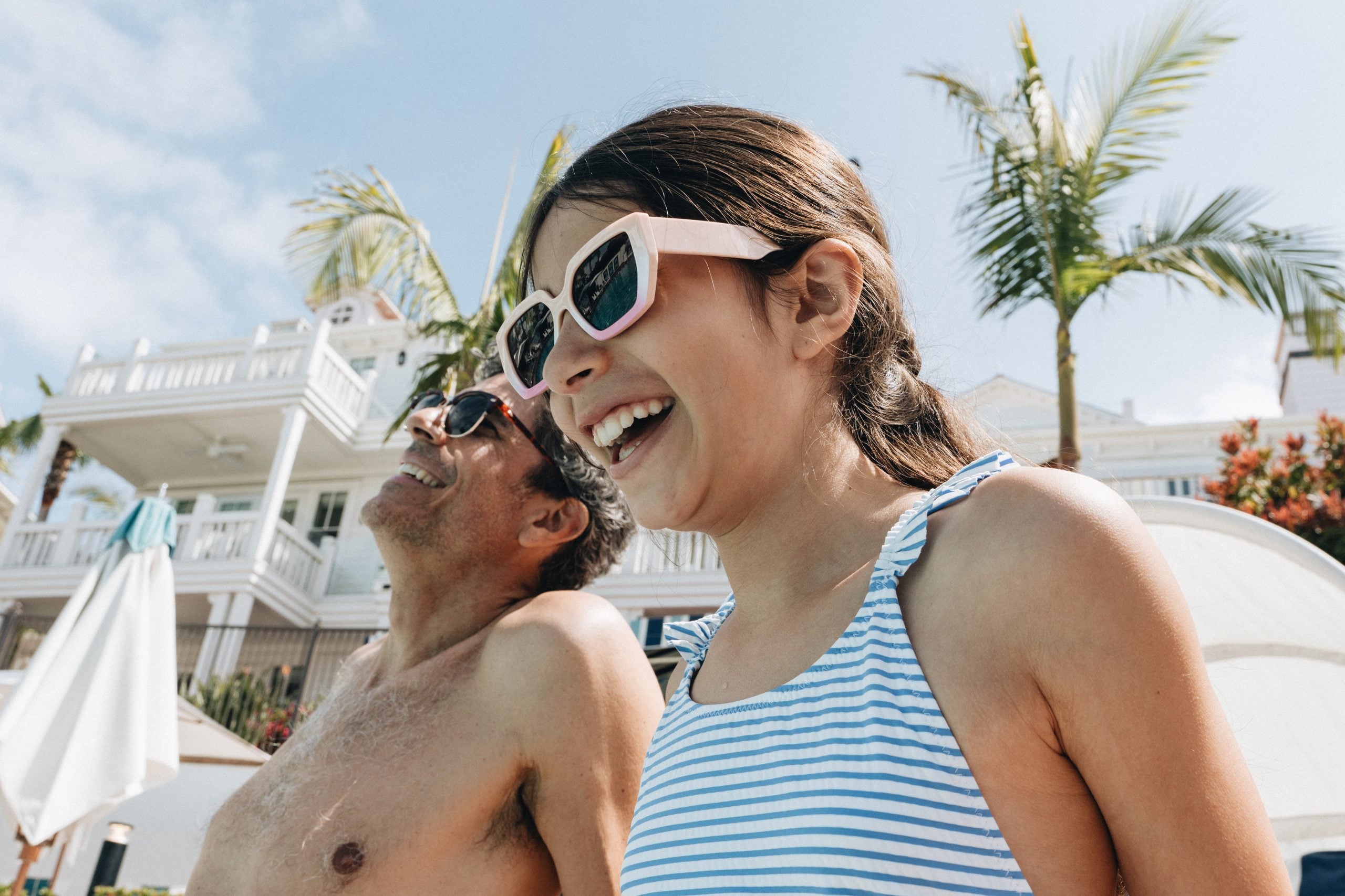 dad and daughter laughing